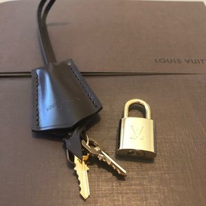 Louis Vuitton lock and key holder for Alma BB